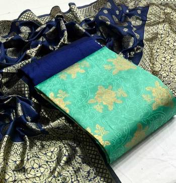 Look This Weaved Straight Suit In Fine Color. This Pretty Suit Is Banarasi Jacquard Based Top And Dupatta Beautified With Weave Designer And Bottom Are Tapeta Silk. Its Fabric Gives A Rich Look To Your Personalit.
