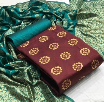 Look This Weaved Straight Suit In Fine Color. This Pretty Suit Is Banarasi Jacquard Based Top And Dupatta Beautified With Weave Designer And Bottom Are Tapeta Silk. Its Fabric Gives A Rich Look To Your Personalit.