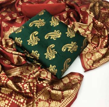 Garb This Weaved Straight Suit In Fine Color. This Pretty Suit Is Banarasi Jacquard Based Top And Dupatta Beautified With Weave Designer And Bottom Are Tapeta Silk. Its Fabric Gives A Rich Look To Your Personalit.