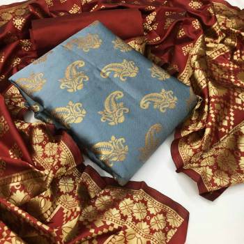 Garb This Weaved Straight Suit In Fine Color. This Pretty Suit Is Banarasi Jacquard Based Top And Dupatta Beautified With Weave Designer And Bottom Are Tapeta Silk. Its Fabric Gives A Rich Look To Your Personalit.