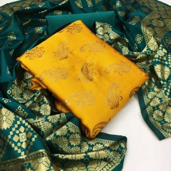 Garb This Weaved Straight Suit In Fine Color. This Pretty Suit Is Banarasi Jacquard Based Top And Dupatta Beautified With Weave Designer And Bottom Are Tapeta Silk. Its Fabric Gives A Rich Look To Your Personalit.