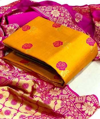 Garb This Weaved Straight Suit In Fine Color. This Pretty Suit Is Banarasi Jacquard Based Top And Dupatta Beautified With Weave Designer And Bottom Are Tapeta Silk. Its Fabric Gives A Rich Look To Your Personalit.
