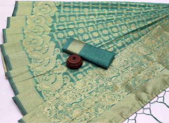 Attrective Look This Festive Season In This Very Pretty Fine Colored Designer Saree Paired With Blouse. This Saree and Blouse Are Banarasi Cotton Based Beautified With Detailed Wevon Jacquard Designer Saree. 