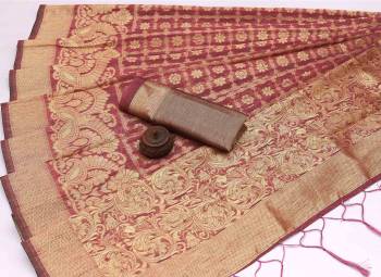 Attrective Look This Festive Season In This Very Pretty Fine Colored Designer Saree Paired With Blouse. This Saree and Blouse Are Banarasi Cotton Based Beautified With Detailed Wevon Jacquard Designer Saree. 