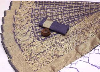 Attrective Look This Festive Season In This Very Pretty Fine Colored Designer Saree Paired With Blouse. This Saree and Blouse Are Banarasi Cotton Based Beautified With Detailed Wevon Jacquard Designer Saree. 