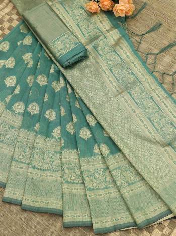 Attrective Look This Festive Season In This Very Pretty Fine Colored Designer Saree Paired With Blouse. This Saree and Blouse Are Banarasi Cotton Based Beautified With Detailed Wevon Jacquard Designer Saree. 