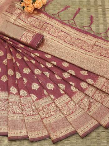 Attrective Look This Festive Season In This Very Pretty Fine Colored Designer Saree Paired With Blouse. This Saree and Blouse Are Banarasi Cotton Based Beautified With Detailed Wevon Jacquard Designer Saree. 
