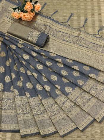Attrective Look This Festive Season In This Very Pretty Fine Colored Designer Saree Paired With Blouse. This Saree and Blouse Are Banarasi Cotton Based Beautified With Detailed Wevon Jacquard Designer Saree. 