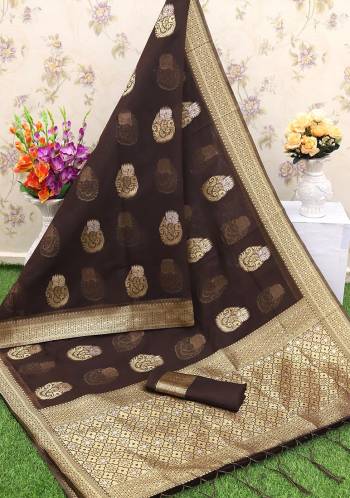 Adorn The Pretty Angelic Look Wearing This Heavy Wevon Designer Saree In Fine Color Paired With Contrasting Colored Blouse. This Saree Is Fabricated On Banarasi Silk Paired With Banarasi Silk Fabricated Blouse. Its Pretty Color Pallete Will Give An Attractive Look To Your Personality. 