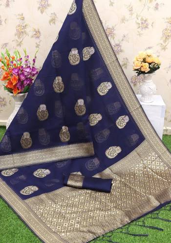 Adorn The Pretty Angelic Look Wearing This Heavy Wevon Designer Saree In Fine Color Paired With Contrasting Colored Blouse. This Saree Is Fabricated On Banarasi Silk Paired With Banarasi Silk Fabricated Blouse. Its Pretty Color Pallete Will Give An Attractive Look To Your Personality. 