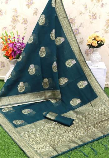 Adorn The Pretty Angelic Look Wearing This Heavy Wevon Designer Saree In Fine Color Paired With Contrasting Colored Blouse. This Saree Is Fabricated On Banarasi Silk Paired With Banarasi Silk Fabricated Blouse. Its Pretty Color Pallete Will Give An Attractive Look To Your Personality. 
