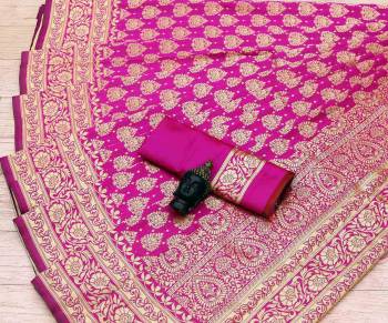 Celebrate This Festive Season In This Very Pretty Dark Colored Designer Saree Paired With Blouse. This Saree and Blouse Are Litchi Silk Based Beautified With Detailed Wevon Jacquard Designer Saree. 