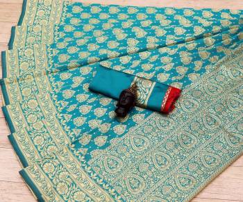 Celebrate This Festive Season In This Very Pretty Dark Colored Designer Saree Paired With Blouse. This Saree and Blouse Are Litchi Silk Based Beautified With Detailed Wevon Jacquard Designer Saree. 