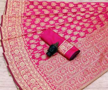 Celebrate This Festive Season In This Very Pretty Dark Colored Designer Saree Paired With Blouse. This Saree and Blouse Are Litchi Silk Based Beautified With Detailed Wevon Jacquard Designer Saree. 