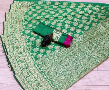 Celebrate This Festive Season In This Very Pretty Dark Colored Designer Saree Paired With Blouse. This Saree and Blouse Are Litchi Silk Based Beautified With Detailed Wevon Jacquard Designer Saree. 
