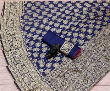 Celebrate This Festive Season In This Very Pretty Dark Colored Designer Saree Paired With Blouse. This Saree and Blouse Are Litchi Silk Based Beautified With Detailed Wevon Jacquard Designer Saree. 