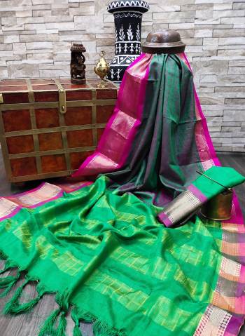 Celebrate This Festive Season In This Very Pretty Fine Colored Designer Saree Paired With Contrasting Colored Blouse. This Saree and Blouse Are Soft Silk Based Beautified With Detailed Wevon Designer Chex Saree. 