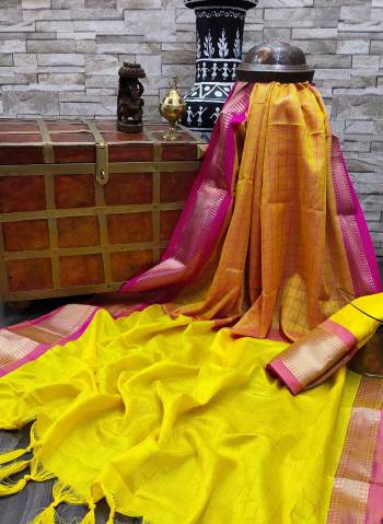 Celebrate This Festive Season In This Very Pretty Fine Colored Designer Saree Paired With Contrasting Colored Blouse. This Saree and Blouse Are Soft Silk Based Beautified With Detailed Wevon Designer Chex Saree. 