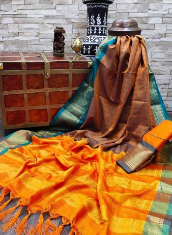 Celebrate This Festive Season In This Very Pretty Fine Colored Designer Saree Paired With Contrasting Colored Blouse. This Saree and Blouse Are Soft Silk Based Beautified With Detailed Wevon Designer Chex Saree. 