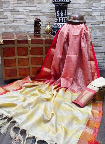 Celebrate This Festive Season In This Very Pretty Fine Colored Designer Saree Paired With Contrasting Colored Blouse. This Saree and Blouse Are Soft Silk Based Beautified With Detailed Wevon Designer Chex Saree. 