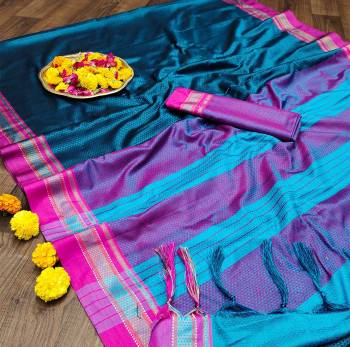 Celebrate This Festive Season In This Very Pretty Fine Colored Designer Saree Paired With Contrasting Colored Blouse. This Saree and Blouse Are Soft Silk Based Beautified With Detailed Wevon Designer Saree. 