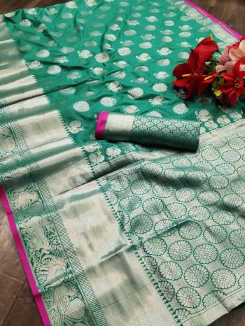 Adorn The Pretty Angelic Look Wearing This Heavy Wevon Jacquard Designer Saree In Fine Color Paired With Blouse. This Saree Is Fabricated On Banarasi Silk Paired With Banarasi Silk Fabricated Blouse. Its Pretty Color Pallete Will Give An Attractive Look To Your Personality. 