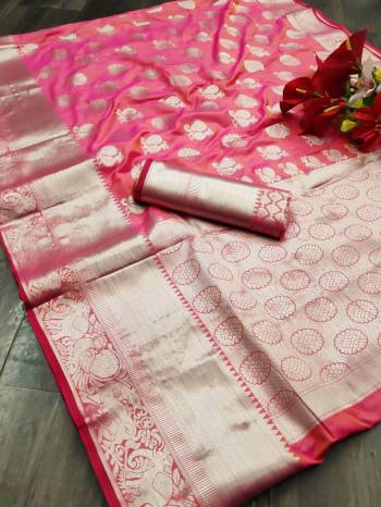 Adorn The Pretty Angelic Look Wearing This Heavy Wevon Jacquard Designer Saree In Fine Color Paired With Blouse. This Saree Is Fabricated On Banarasi Silk Paired With Banarasi Silk Fabricated Blouse. Its Pretty Color Pallete Will Give An Attractive Look To Your Personality. 