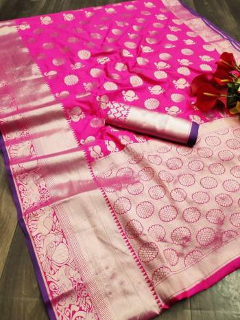 Adorn The Pretty Angelic Look Wearing This Heavy Wevon Jacquard Designer Saree In Fine Color Paired With Blouse. This Saree Is Fabricated On Banarasi Silk Paired With Banarasi Silk Fabricated Blouse. Its Pretty Color Pallete Will Give An Attractive Look To Your Personality. 