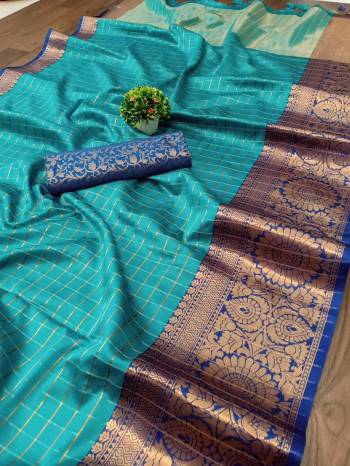 Garb This Pretty Angelic Wearing This Wevon Jacquard Designer Saree In Fine Color Paired With Contrased Color Blouse. This Saree Is Fabricated On Cotton Silk Paired With Cotton Silk Fabricated Blouse. Its Pretty Color Pallete Will Give An Attractive Look To Your Personality. 