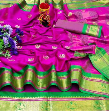Adorn The Pretty Angelic Look Wearing This Heavy Wevon Paithani Jacquard Designer Saree In Fine Color Paired With Blouse. This Saree Is Fabricated On Cotton Silk Paired With Cotton Silk Fabricated Blouse. Its Pretty Color Pallete Will Give An Attractive Look To Your Personality. 