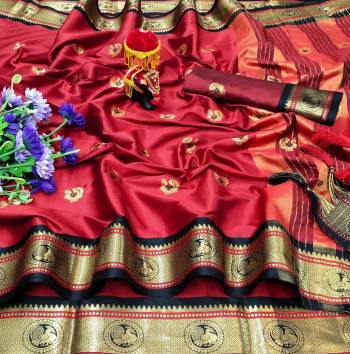 Adorn The Pretty Angelic Look Wearing This Heavy Wevon Paithani Jacquard Designer Saree In Fine Color Paired With Blouse. This Saree Is Fabricated On Cotton Silk Paired With Cotton Silk Fabricated Blouse. Its Pretty Color Pallete Will Give An Attractive Look To Your Personality. 