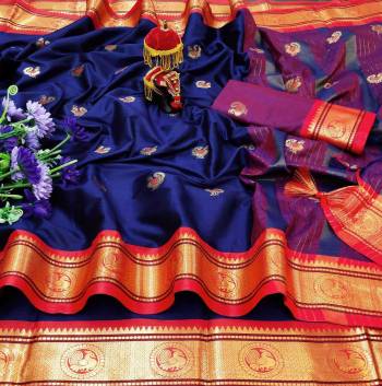 Adorn The Pretty Angelic Look Wearing This Heavy Wevon Paithani Jacquard Designer Saree In Fine Color Paired With Blouse. This Saree Is Fabricated On Cotton Silk Paired With Cotton Silk Fabricated Blouse. Its Pretty Color Pallete Will Give An Attractive Look To Your Personality. 