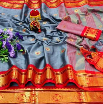Adorn The Pretty Angelic Look Wearing This Heavy Wevon Paithani Jacquard Designer Saree In Fine Color Paired With Blouse. This Saree Is Fabricated On Cotton Silk Paired With Cotton Silk Fabricated Blouse. Its Pretty Color Pallete Will Give An Attractive Look To Your Personality. 