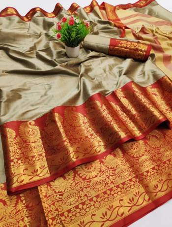 Garb This Pretty Angelic Look Wearing This Heavy Wevon Jacquard Designer Saree In Fine Color Paired With Blouse. This Saree Is Fabricated On Cotton Silk Paired With Cotton Silk Fabricated Blouse. Its Pretty Color Pallete Will Give An Attractive Look To Your Personality. 