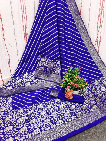 Adorn The Pretty Angelic Look Wearing This Party Wear Heavy Designer Wevon Jacquard Work Saree With Blouse. This Saree Is Fabricated On Banarasi Cotton Paired With Blouse. Its Pretty Color Pallete Will Give An Attractive Look To Your Personality. 