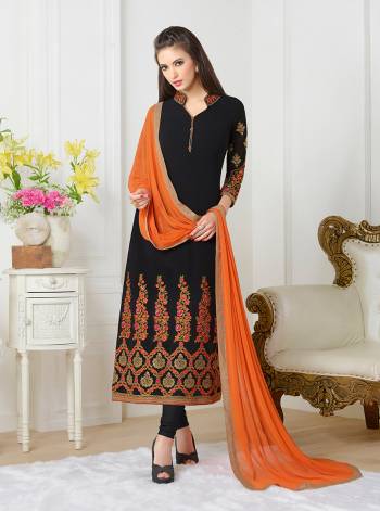 Look Graceful And Classy  At The Upcoming  Party By Wearing This Magestic Black  Colored Suit With Orange Dupatta.This Set Will Surely Make You Stand Out From The Crowd. 