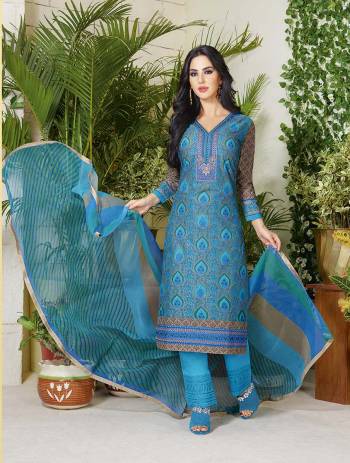 Stay Cool And Calm with This Blue Colored Suit As A Dress Material. Get This Stitched Soon Into A Plazzo Set Or Chudidar As Per Your Desired Fit And Comfort. Add This To Your Wardrobe Soon.