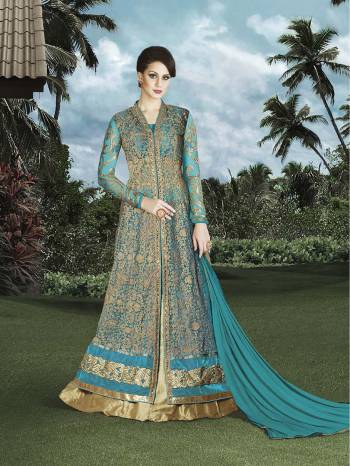 For A Different You   Grab This Beige And Sky Blue Colored Dress Paired With Beige Colored Bottom And Sky Blue Colored Chiffon Fabricated Dupatta. This Indo-Western Dress Will Make You Look The Most Prettiest. 