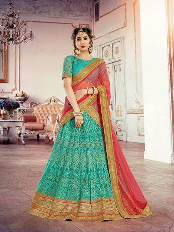 Enhance Your Ethenic Look With This Sea Green Colored Lehenga Choli Paired With Contrasting Old Rose Pink Colored Dupatta. This Lehenga Choli Has Heavy Embroidery All Over Making It More Heavy And Attractive. This Lehenga Choli Is Fabricated On Net Which Is Light In Weight And Easy To Carry All Day Long.