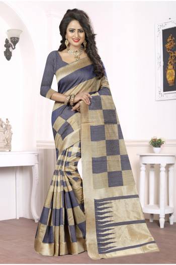 Add A Liitle Charm To Your Beauty With This Grey And Beige Colored Saree Fabricated On Kanjivaram Art Silk. This Saree Will Make You Earn Lots Of Compliments From Onlookers. Buy This Pretty Saree Now.