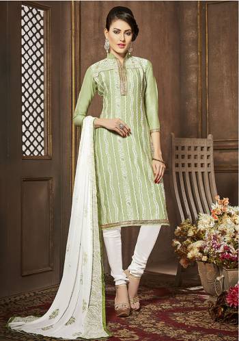 Pastel Play And Subtle Shades Is What You Need In Summer Casuals. Grab This Mint Green Colored Suit Paired With White Colored Bottom And Dupatta And Get This Dress Material Stitched Into Salwar Kameez As Per Your Size And Comfort. 