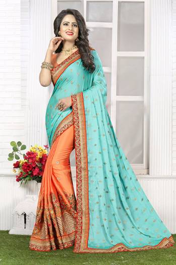 Add Charm To Your Beauty With This Aqua Blue And Light Orange Colored Saree Fabricated On Crepe Silk Which Has Lustor So It Is Soft Towards Skin And Gives You Party Look Wearing This Pretty Saree. Buy It Now.