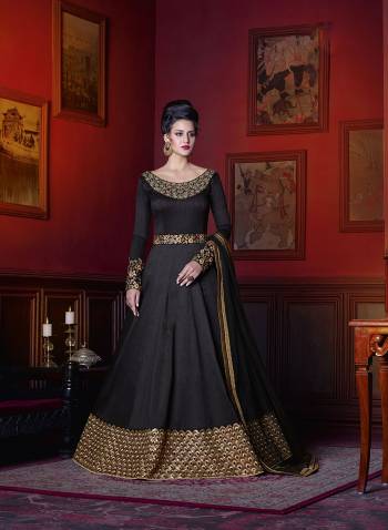 Black Color Adds More Beauty To Your Personality Compared To Any Other Color. Grab This Elegant And Beautiful Black Colored Floor Length Suit Paired With Black Colored Bottom And Dupatta. Its Top Is Fabricated On Art Silk Paired With Santoon Bottom And Net Dupatta. This Suit Is Comfortable To Carry All Day Long.Buy It Now.