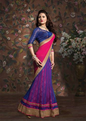 Grab This Beautiful Blue Colored Lehenga Choli Paired With Cntrasting Pink Colored Dupatta. Its Blouse Is Fabricated On Brocade Paired With Net And Brocade Fabricated Lehenga And Chiffon Dupatta. 