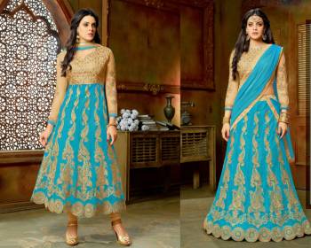 Enhance Your Beauty With This Beautiful Attire In Beige Colored Top And Bottom Pared With Turquoise Blue Colored Lehenga And Dupatta. You Can Get This Stitched As An Anarkali Suit Or As A Lehenga Choli. Grab This Lovely Offer Now.