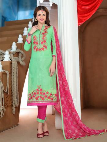 Here Is A Very Lovely Color In Straight-Cut Dress Material With Sea Green Colored Top Paired With Dark Pink Colored Bottom And Dupatta. Its Top Is Fabricated On Glaze Cotton Paired With Cotton Bottom And Chiffon Dupatta. This Pretty Suit Will Definitely Earn You Lots Of Compliments From Onlookers.