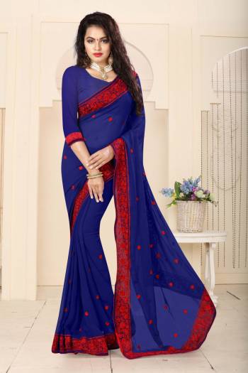 Look Simple Amazing Wearing This Attractive Royal Blue Colored Saree Paired With Royal Blue Colored Blouse. This Saree And Blouse Are Fabricated On Georgette. It Is Beautified With Thread Embroidery All Over And Heavy Lace Border. This Saree And Blouse Are Soft Towards Skin And Easy To Carry All Day Long. 