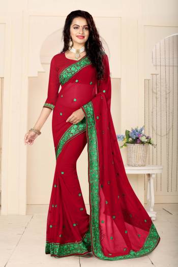 Adorn The Super Amazing Look Wearing This Maroon Colored Saree Paired With Maroon Colored Blouse. This Saree And Blouse Are Fabricated On Georgette Beautified With Thread Embroidery All Over. This Saree Is Light Weight And Easy To Carry All Day Long.