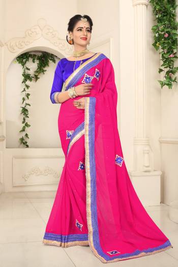 Bright And Visually Appealig, Grab This Attractive Fuschia Pink Colored Saree Paired With Contrasting Purple Colored Blouse. This Saree Is Fabricated On Georgette Paired With Art Silk Fabricated Blouse. It Has Attractive Patch Work And Lace Border. Buy This Saree Now.