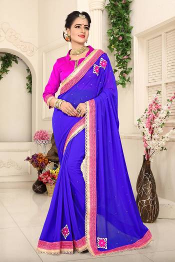 Add This Pretty Saree To Your Wardrobe In Blue Color Paired With Contrasting Fuschia Pink Colored Blouse. This Saree Is Fabricated On Georgette Paired With Art Silk Fabricated Blouse. It Is Light Weight And Easy To Carry All Day Long.